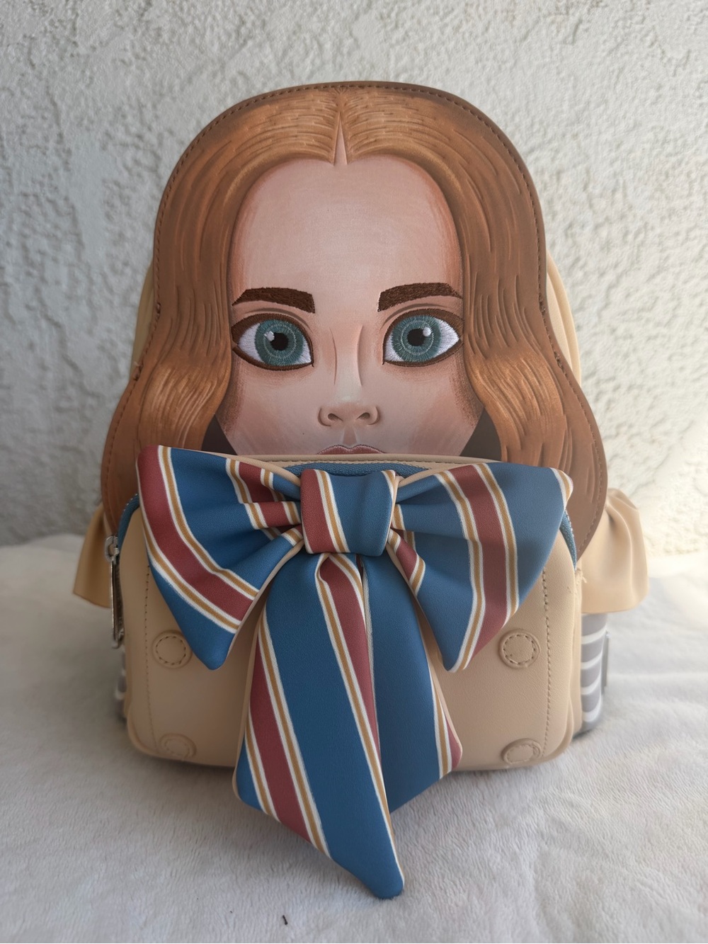 Beige MEGAN Loungefly Backpack with Blue Striped Bow
